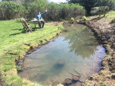 Coffee time to celebrate the newly relined and restocked pond